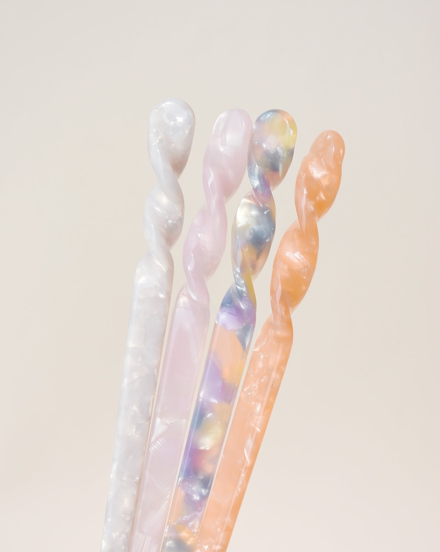Bâton à cheveux en acétate en pastels
