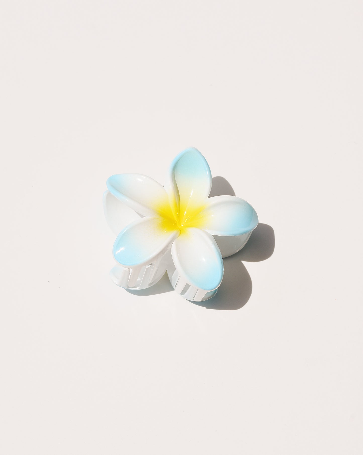 Plumeria-Blumenklammer in Blau