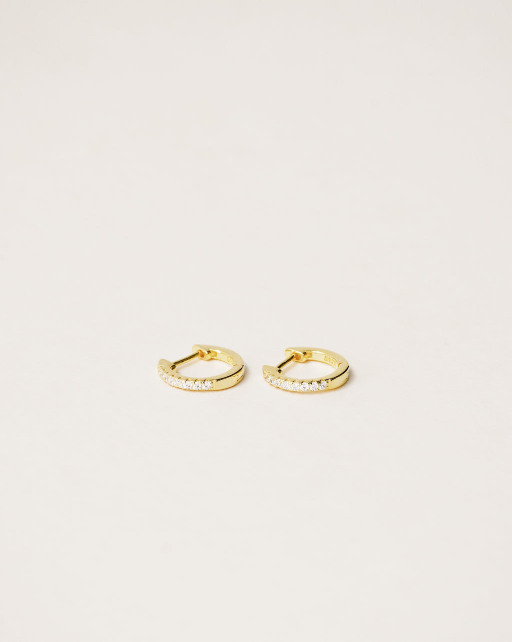 Pavé huggie hoop earrings