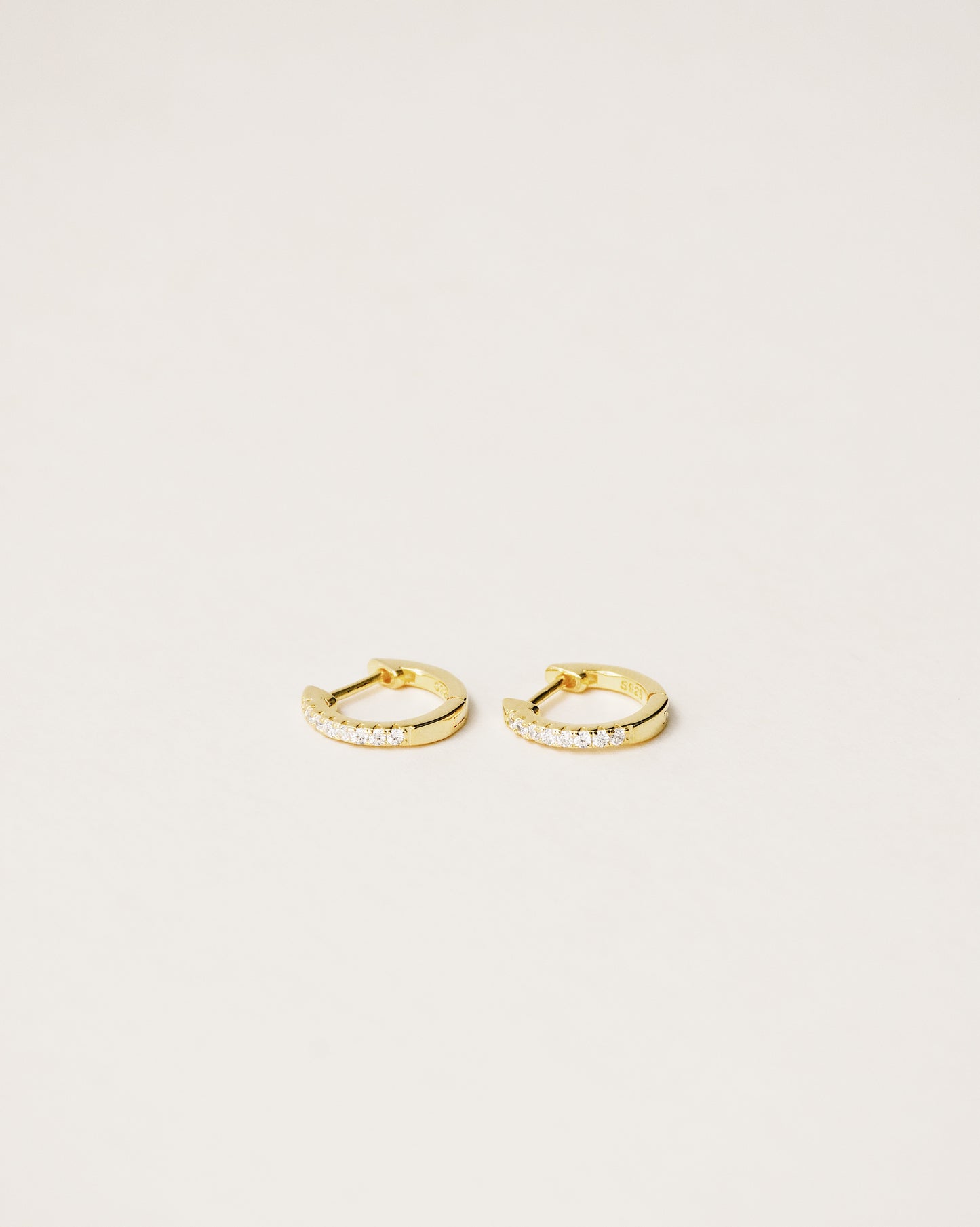 Pavé huggie hoop earrings