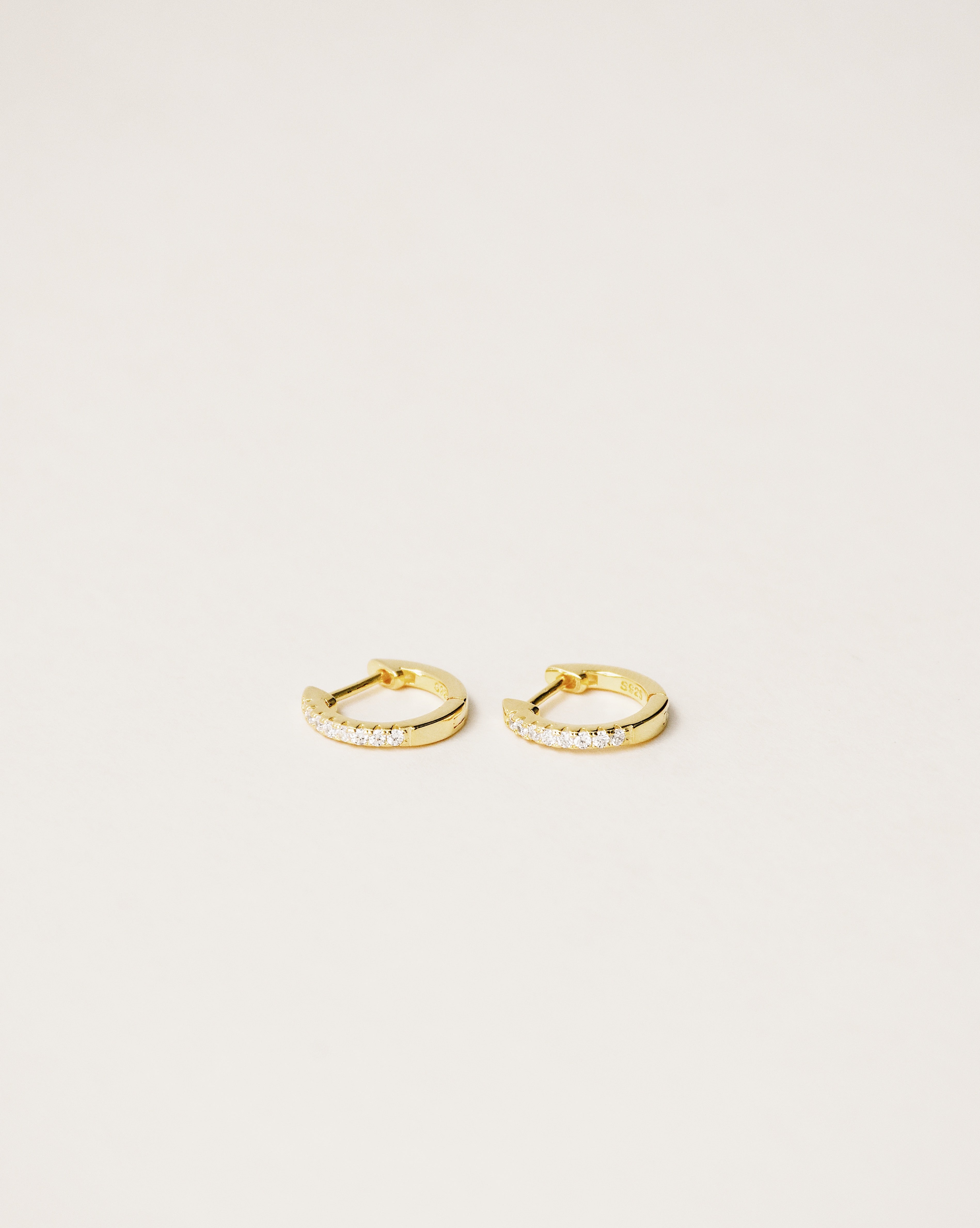 Pavé huggie hoop earrings