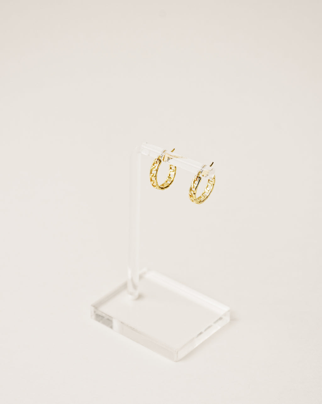 chain shape mini hoop earrings handcrafted from 925 sterling silver plated in 18k gold. 2020 slow fashion trend.