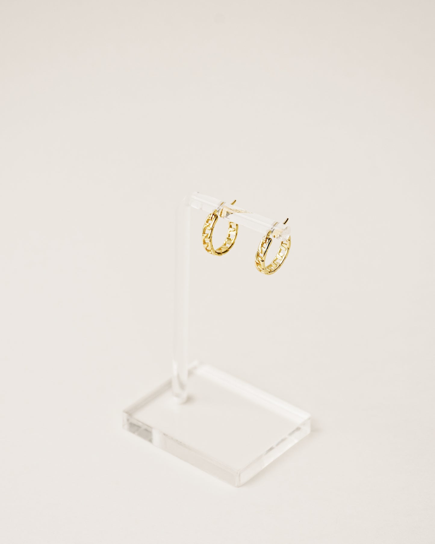 chain shape mini hoop earrings handcrafted from 925 sterling silver plated in 18k gold. 2020 slow fashion trend.