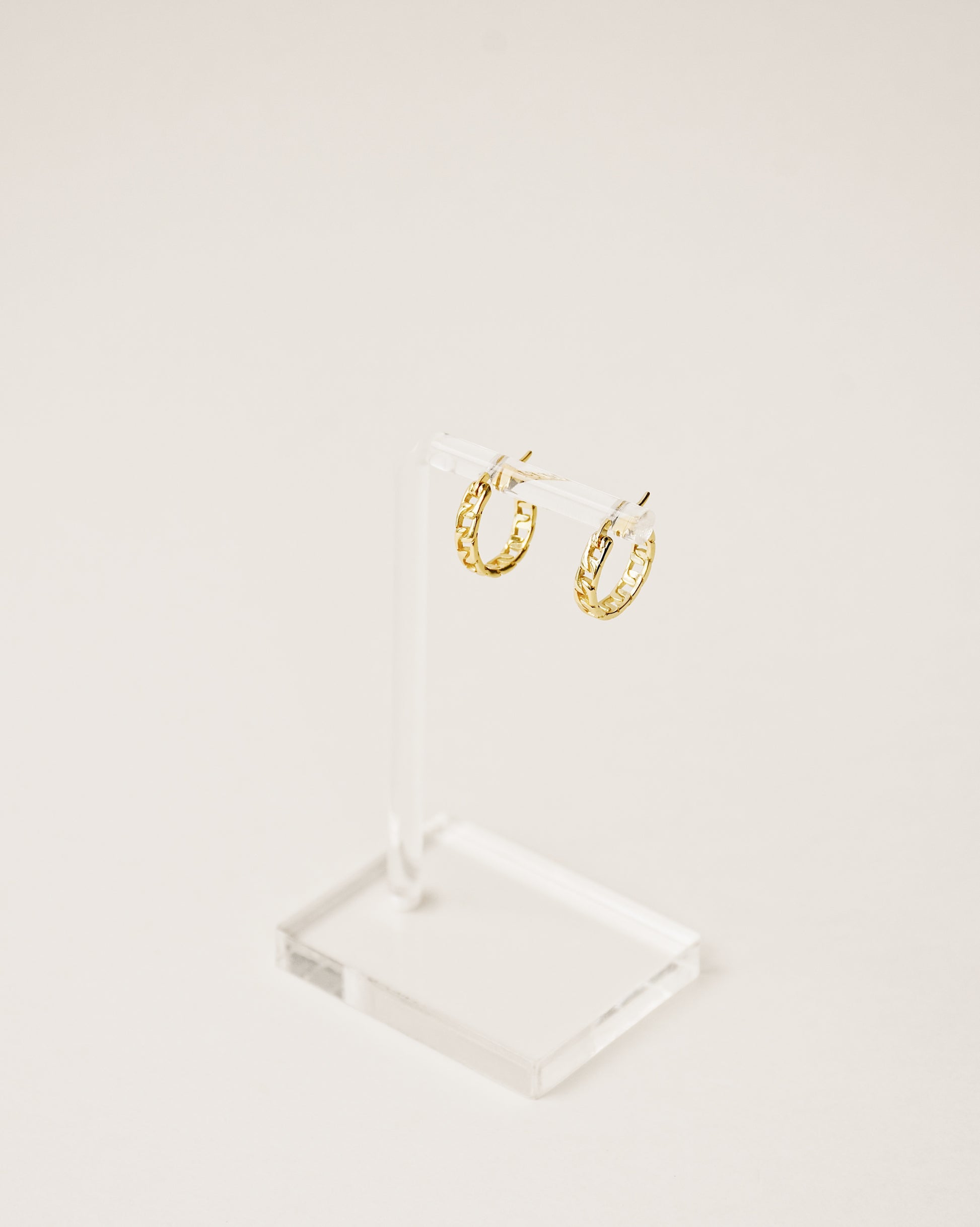chain shape mini hoop earrings handcrafted from 925 sterling silver plated in 18k gold. 2020 slow fashion trend.