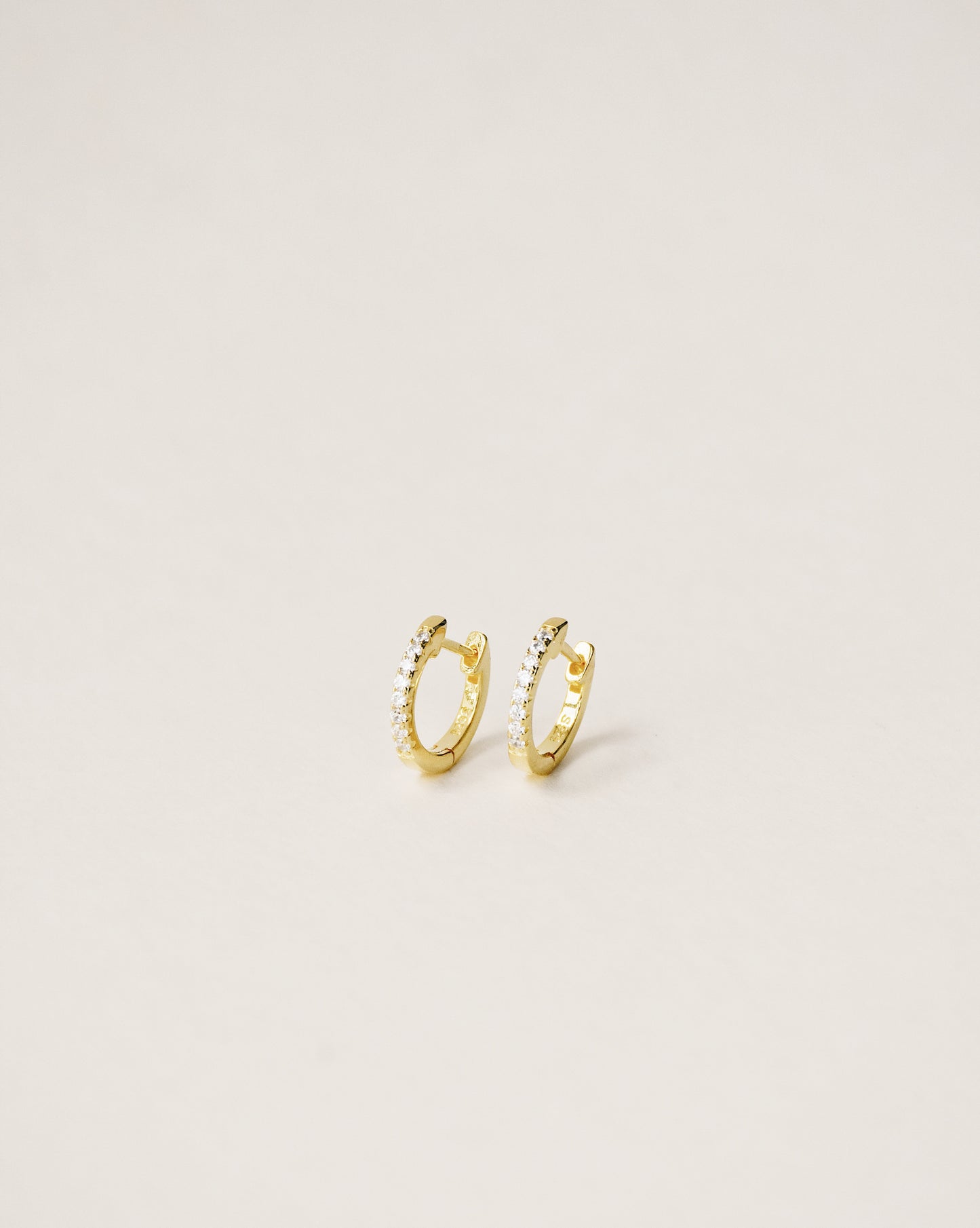 Pavé huggie hoop earrings
