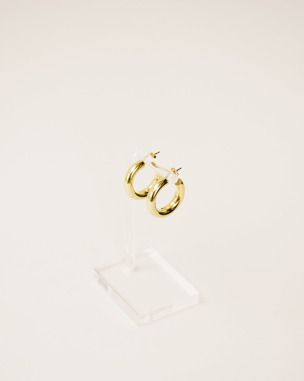 timeless and versatile maxi hoop earrings handcrafted from 925 sterling silver plated in 18k gold. hollow and lightweight. 2020 slow fashion trend.