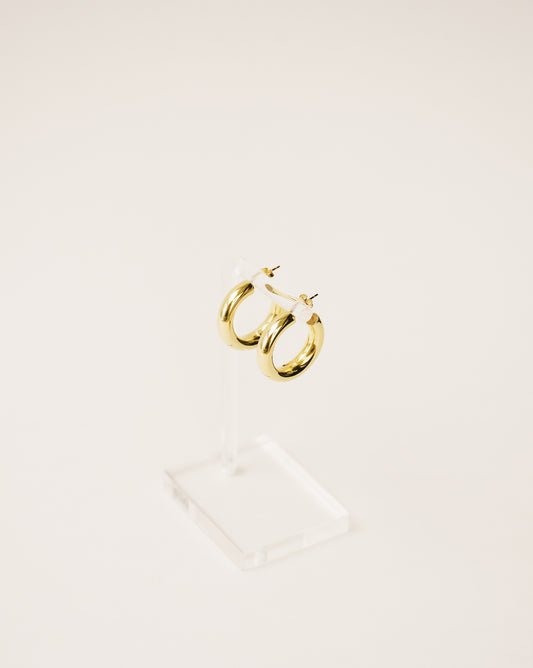 timeless and versatile maxi hoop earrings handcrafted from 925 sterling silver plated in 18k gold. hollow and lightweight. 2020 slow fashion trend.