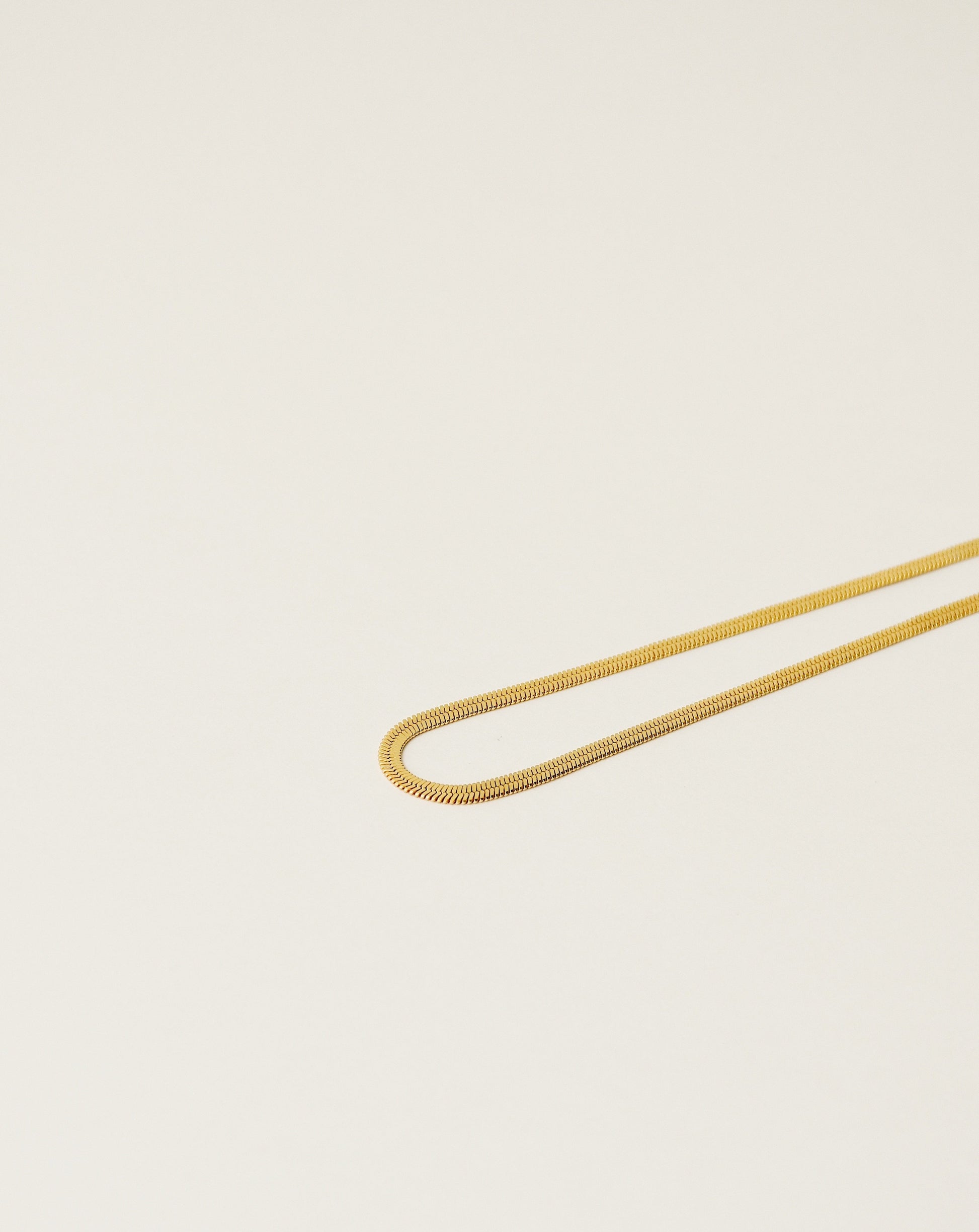 herringbone chain handcrafted from 925 sterling silver plated in 18k gold. 2020 slow fashion trend.