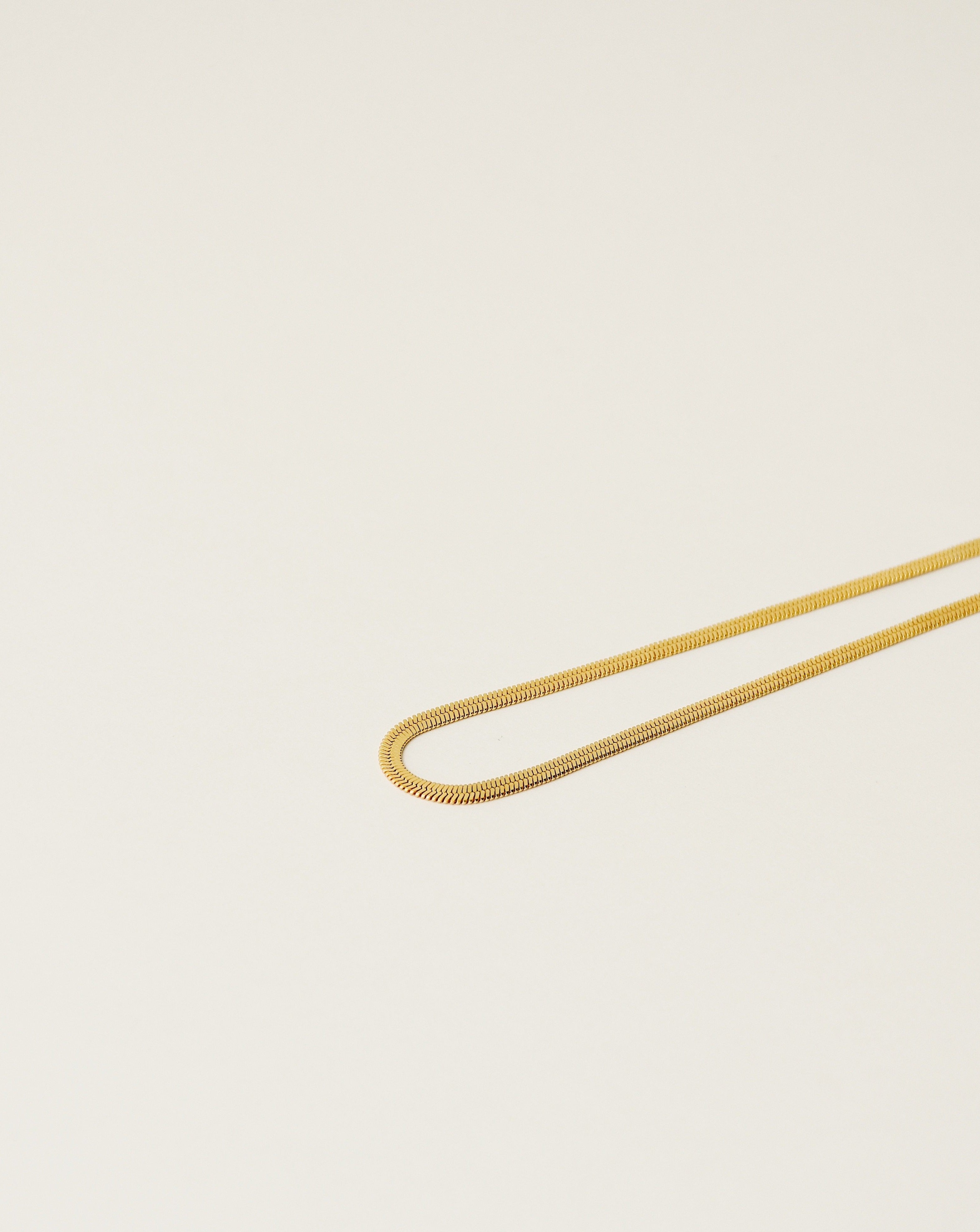 herringbone chain handcrafted from 925 sterling silver plated in 18k gold. 2020 slow fashion trend.