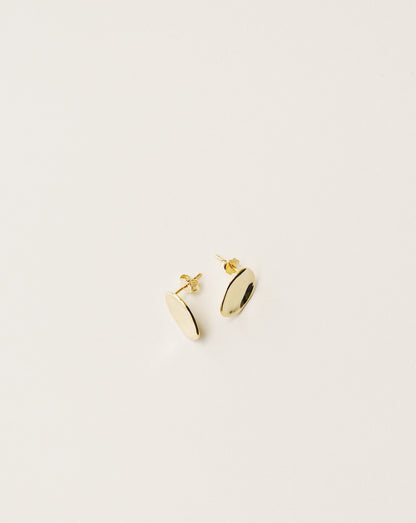 irregularly shaped stud earrings handcrafted from 925 sterling silver plated in 18k gold. 2020 slow fashion trend.