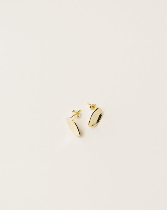 irregularly shaped stud earrings handcrafted from 925 sterling silver plated in 18k gold. 2020 slow fashion trend.