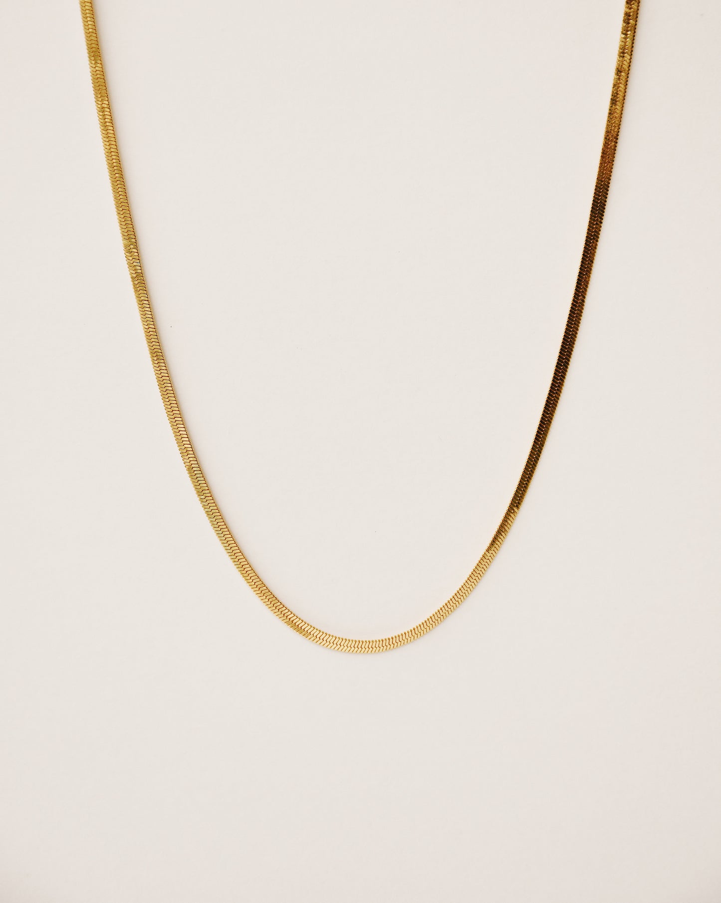 herringbone chain handcrafted from 925 sterling silver plated in 18k gold. 2020 slow fashion trend.