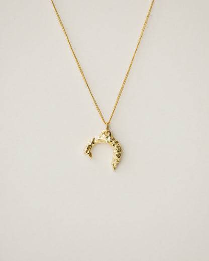 irregularly shaped pendant necklace handcrafted from 925 sterling silver plated in 18k gold. 2020 slow fashion trend.