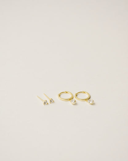 flawless and dainty white zirconia studs handcrafted from 925 sterling silver plated in 18k gold. 2020 slow fashion trend.
