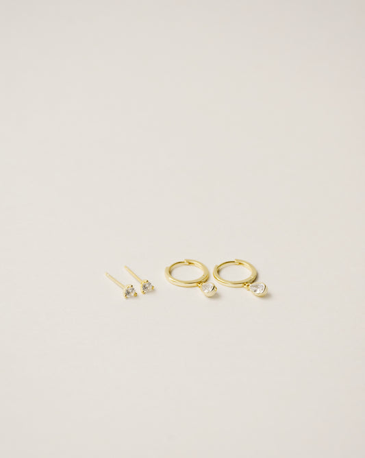 flawless and dainty white zirconia studs handcrafted from 925 sterling silver plated in 18k gold. 2020 slow fashion trend.